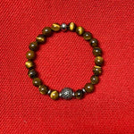 Tiger eyes Gemstones BR     Black carving bead