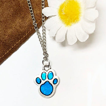 Enamel blue paw pendant NK